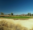 The finishing hole at Southern Dunes Golf Club has a green that is well protected by bunkers and water.