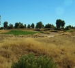The par-3 fourth hole at Southern Dunes G.C. has plenty of bunkers to help hide the flag.