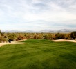 The fourth hole on the Cholla course at We-Ko-Pa Golf Club is a long, downhill par 4. 