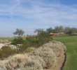 Several of Raven Verrado's holes dogleg around the desert