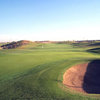 A view of green #9 protected by bunker at Coldwater Golf Club